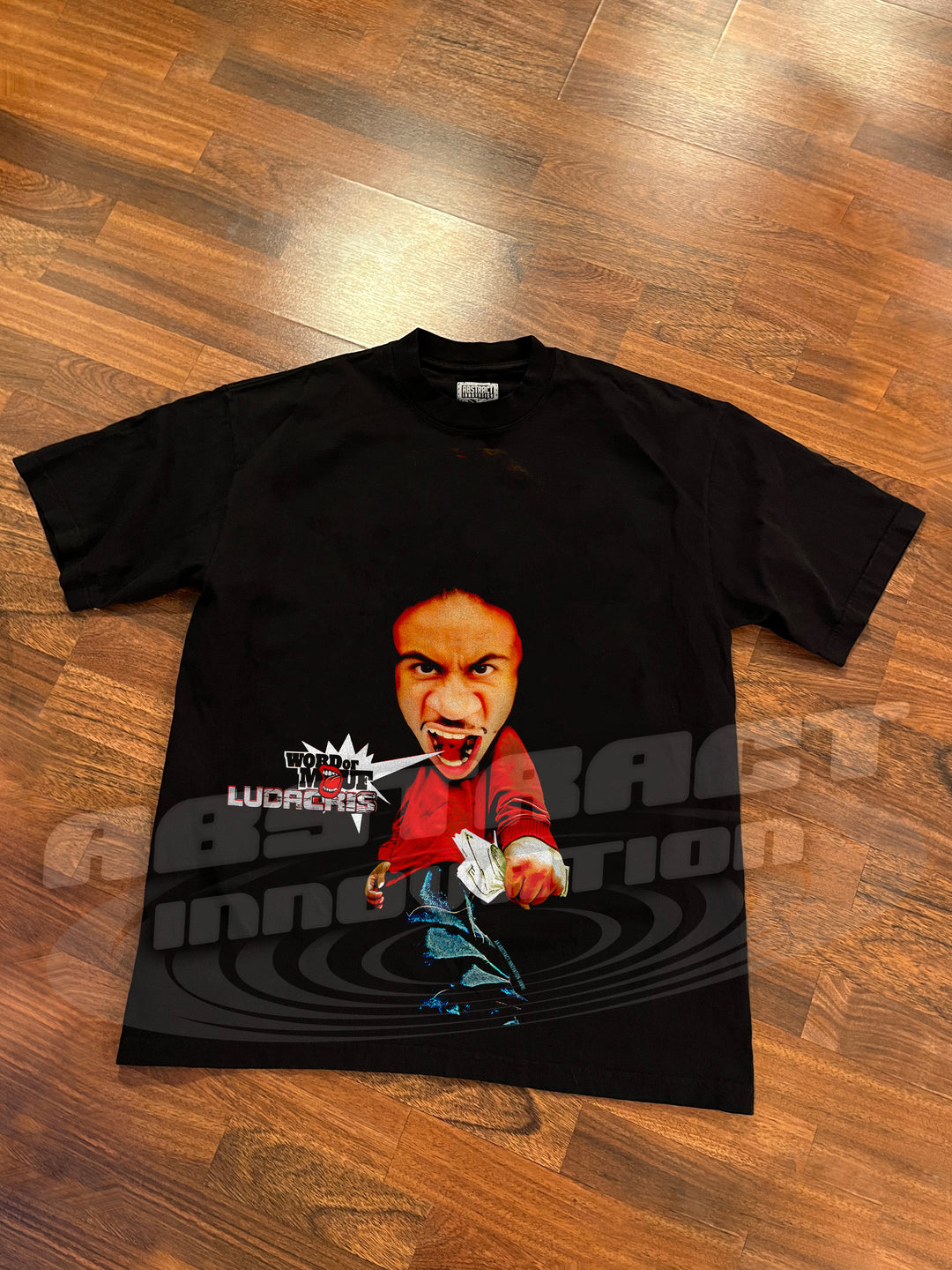 THE WORD OF MOUF TEE